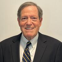 Headshot of John R Whitman